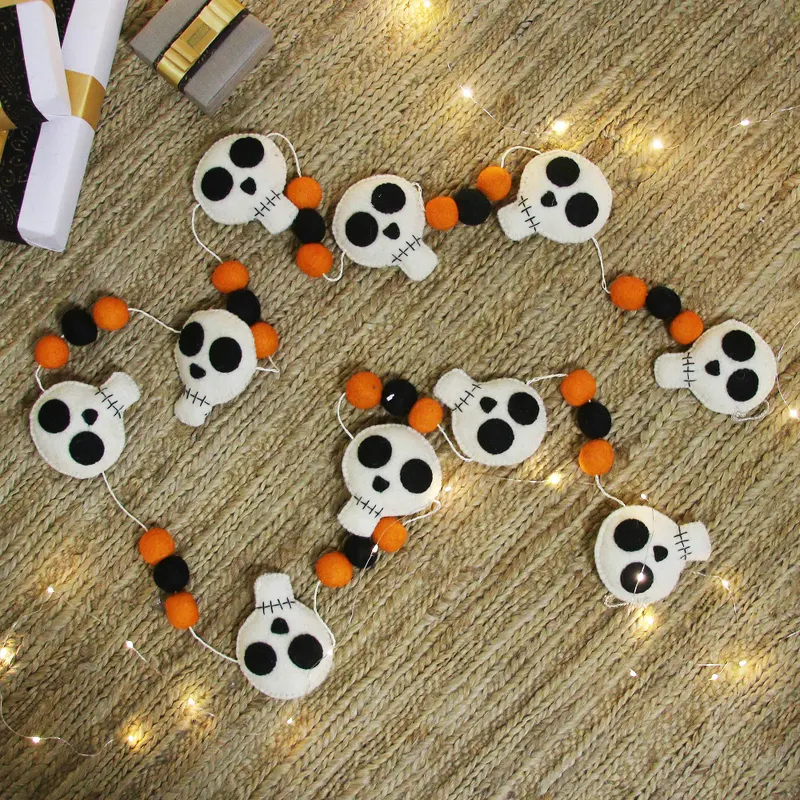 Spooky Skulls Handcrafted Halloween-Themed Wool Felt Garland from India By Rajesh Gehlot ) handcrafted product