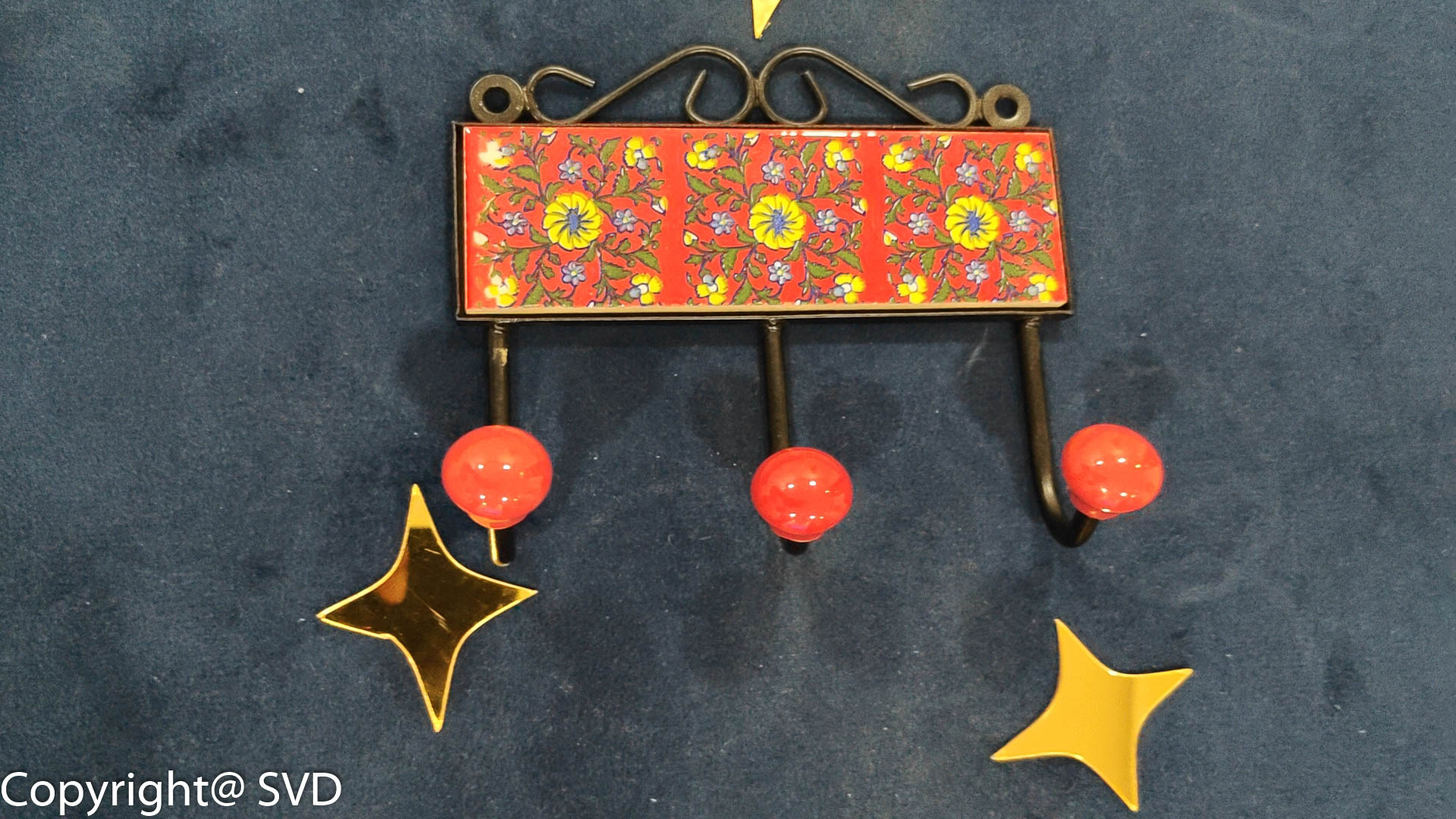 Clothes Hanger in Blue Pottery tile.